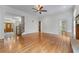 Spacious living area featuring hardwood floors and an open floor plan, blending classic style with modern living at 6020 Cochran Mill Rd, Palmetto, GA 30268