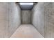 Unfinished storage room with concrete walls and ceiling providing ample storage space at 6020 Cochran Mill Rd, Palmetto, GA 30268
