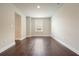 Bedroom with hardwood floors, natural light, and neutral paint at 622 Denali Dr, Mableton, GA 30126