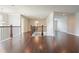 Upstairs hallway with hardwood floors, wrought iron railings, and neutral paint at 622 Denali Dr, Mableton, GA 30126