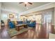 Open living space with hardwood floors, connecting the living room, dining area and kitchen at 622 Denali Dr, Mableton, GA 30126