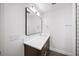 Bathroom features a modern vanity with ample storage and a large, frameless mirror at 3561 Stone Dr, Marietta, GA 30062