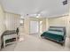 Cozy bedroom featuring neutral carpet, with desk, bed, and closet at 3561 Stone Dr, Marietta, GA 30062