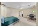 Bedroom features striped wallpaper, neutral carpet, and an attached desk area at 3561 Stone Dr, Marietta, GA 30062