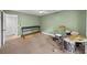 Relaxing bedroom with plush carpet, neutral color scheme, and drum set at 3561 Stone Dr, Marietta, GA 30062