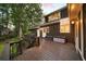 Exterior deck shows the outdoor living space with seating, stairs and access to the home at 3561 Stone Dr, Marietta, GA 30062