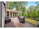 Spacious deck offers an outdoor kitchen area, with grill, storage and screened in porch in the background at 3561 Stone Dr, Marietta, GA 30062