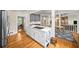 Spacious kitchen with a large island, modern appliances, and open view to dining area at 3561 Stone Dr, Marietta, GA 30062
