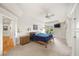 Spacious main bedroom boasts neutral carpet, trey ceilings, a ceiling fan, and large windows at 3561 Stone Dr, Marietta, GA 30062