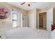 Inviting bedroom with an accent wall, large window, and closet creating a cozy and bright atmosphere at 681 Braidwood Nw Ter, Acworth, GA 30101
