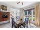 Cozy dining area with natural light, decorative molding and classic furnishings at 681 Braidwood Nw Ter, Acworth, GA 30101