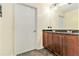 Bathroom boasting double sinks, a dark countertop, tile floor, and a stylish vanity at 171 Auburn Ne Ave # 521, Atlanta, GA 30303