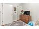 Bedroom featuring warm wood floors and a wooden dresser at 171 Auburn Ne Ave # 521, Atlanta, GA 30303
