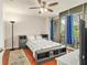 Bright bedroom with natural light, ceiling fan, balcony, and neutral decor at 171 Auburn Ne Ave # 521, Atlanta, GA 30303