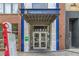 Building Entrance of Piedmont Pad Apartments with a covered entrance and address markers at 171 Auburn Ne Ave # 521, Atlanta, GA 30303