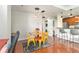Dining area with seating near kitchen, stainless steel appliances, and breakfast bar at 171 Auburn Ne Ave # 521, Atlanta, GA 30303