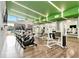 State-of-the-art gym with treadmills, bikes, weights, and green ceilings at 171 Auburn Ne Ave # 521, Atlanta, GA 30303