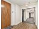 Hallway of an apartment building with apartment doors and an exit sign at 171 Auburn Ne Ave # 521, Atlanta, GA 30303