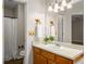 Bathroom featuring single vanity, updated fixtures and a shower/tub combination at 2109 Tranquility Ct, Woodstock, GA 30188