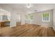Large main bedroom with new wood floors, ensuite bathroom, and mirrored closet doors at 2109 Tranquility Ct, Woodstock, GA 30188