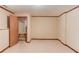 Finished basement featuring an open doorway and wood trim throughout at 3550 Miller Farms Ln, Peachtree Corners, GA 30096