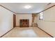 Finished basement featuring a built-in entertainment center and a small window at 3550 Miller Farms Ln, Peachtree Corners, GA 30096