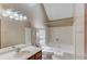 Bathroom showcasing a vanity with a sink, a toilet, and a shower-tub combo at 3550 Miller Farms Ln, Peachtree Corners, GA 30096