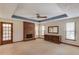 Spacious living room featuring a cozy fireplace and lots of natural light at 3550 Miller Farms Ln, Peachtree Corners, GA 30096