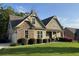 Attractive home with a stone-accented facade, well-kept lawn, and an attached garage at 37 Grand Georgian Ne Ct, Cartersville, GA 30121