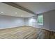 Finished basement with hardwood floors, bright lighting, and easy access to the backyard at 6927 Gallant Se Cir # 11, Mableton, GA 30126