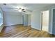 Bright bedroom features hardwood floors, multiple doors, and ample space at 6927 Gallant Se Cir # 11, Mableton, GA 30126