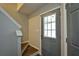 Foyer with stairs, gray front door with glass, and tile flooring at 6927 Gallant Se Cir # 11, Mableton, GA 30126