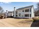 A spacious backyard with a well maintained lawn surrounded by beautiful homes at 1107 Carroll Ct, Norcross, GA 30071