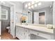 Bathroom featuring a white vanity with a single sink and ample cabinet space at 2722 Spring Side Ct, Douglasville, GA 30135