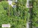 Aerial view outlining property boundaries surrounded by lush trees at 2722 Springside Ct, Douglasville, GA 30135