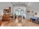 Bright living space with hardwood floors, a fireplace, and large windows with natural light at 4621 Lakeshore Dr, Pine Lake, GA 30072