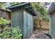 Exterior view of shed with double doors at 4621 Lakeshore Dr, Pine Lake, GA 30072