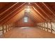Unfinished attic space with exposed wooden beams, offering potential for customization at 47 Oakridge Se Ave, Atlanta, GA 30317