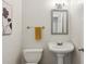 Half bathroom featuring a pedestal sink and neutral decor at 47 Oakridge Se Ave, Atlanta, GA 30317