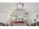 Versatile bonus room with vaulted ceilings, built-in shelves, and stylish decor at 47 Oakridge Se Ave, Atlanta, GA 30317
