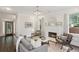 Bright and stylish living room with hardwood floors and a cozy fireplace at 47 Oakridge Se Ave, Atlanta, GA 30317