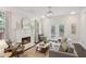 Cozy living room with a fireplace, hardwood floors, and ample natural light at 47 Oakridge Se Ave, Atlanta, GA 30317