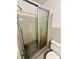 Bathroom featuring tiled shower with a sliding glass door at 1333 Council Bluff Ne Dr, Atlanta, GA 30345