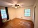 Bright bedroom featuring hardwood floors and closet at 1333 Council Bluff Ne Dr, Atlanta, GA 30345