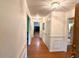 Inviting entryway with hardwood floors, white wainscoting and decorative light fixtures at 1333 Council Bluff Ne Dr, Atlanta, GA 30345