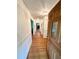 Inviting entryway with hardwood floors, white wainscoting and decorative light fixtures at 1333 Council Bluff Ne Dr, Atlanta, GA 30345