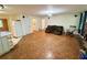 Spacious living room with hardwood floors, fireplace, and ample natural light at 1333 Council Bluff Ne Dr, Atlanta, GA 30345