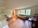 Bright living room with hardwood floors, built-in shelving, and large windows at 1333 Council Bluff Ne Dr, Atlanta, GA 30345