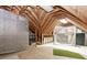 Unfinished attic space with exposed wooden beams, plywood subfloor, and potential for storage or customization at 2727 Bearcreek Pl, Buford, GA 30519
