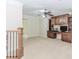 Open loft space with built-in cabinets, desk area, and carpet flooring at 2727 Bearcreek Pl, Buford, GA 30519